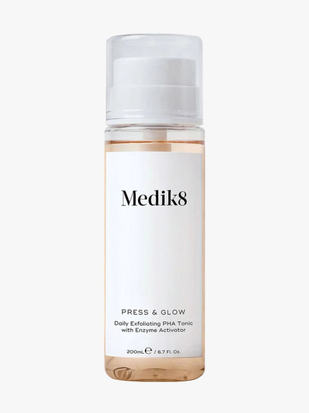 Medik8 Press & Glow Daily Exfoliating PHA Tonic bottle of peach toner with white label on light gray background